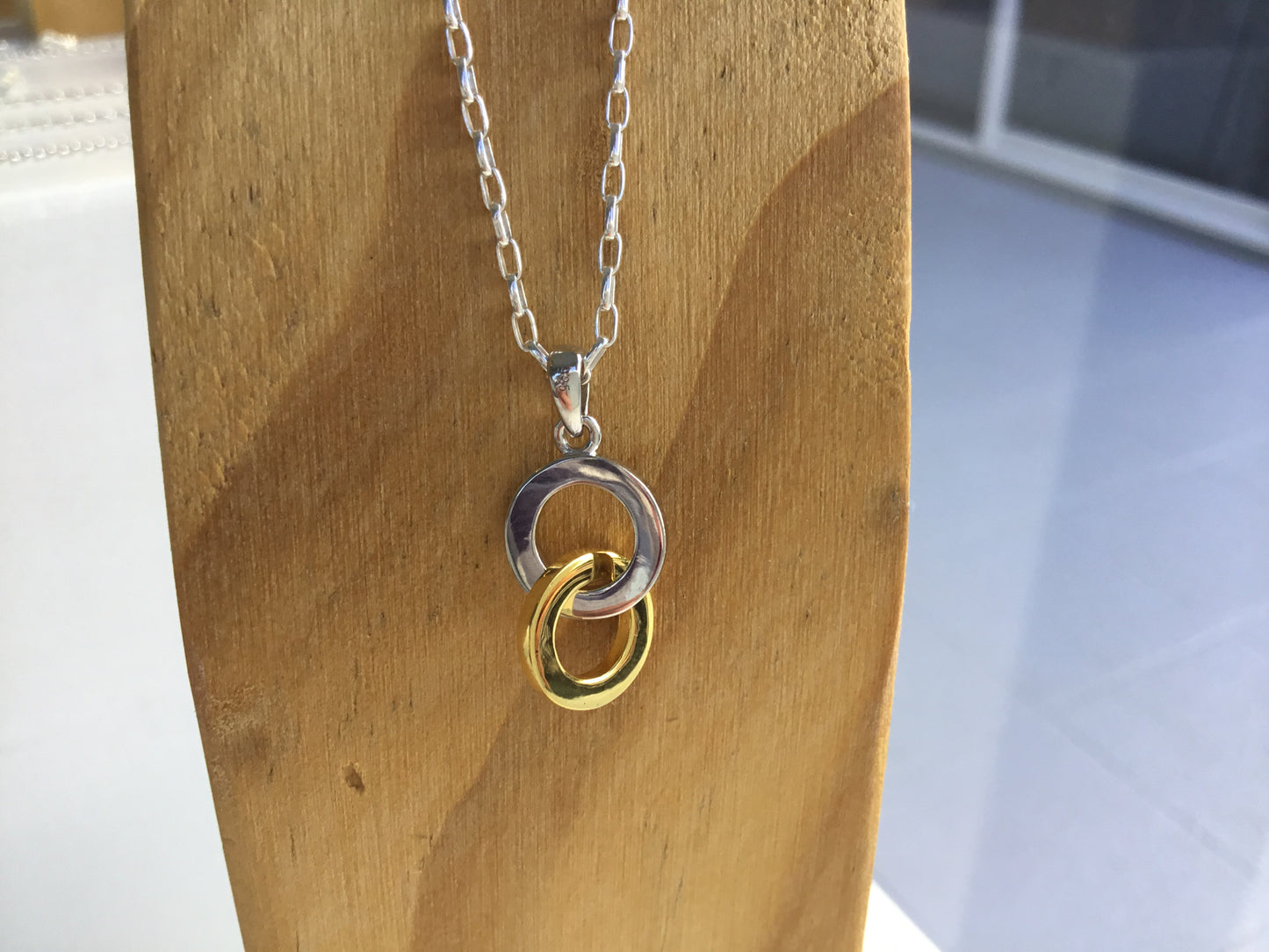 Taharua - 9k gold plate and sterling silver
